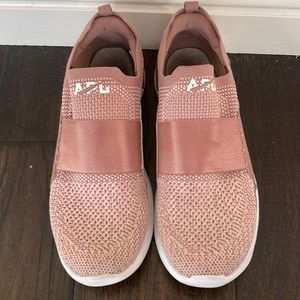 APL dark pink tennis shoes